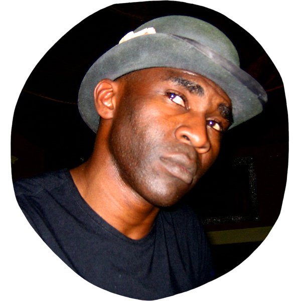 Kola Abidogun wearing his trademark bowler hat